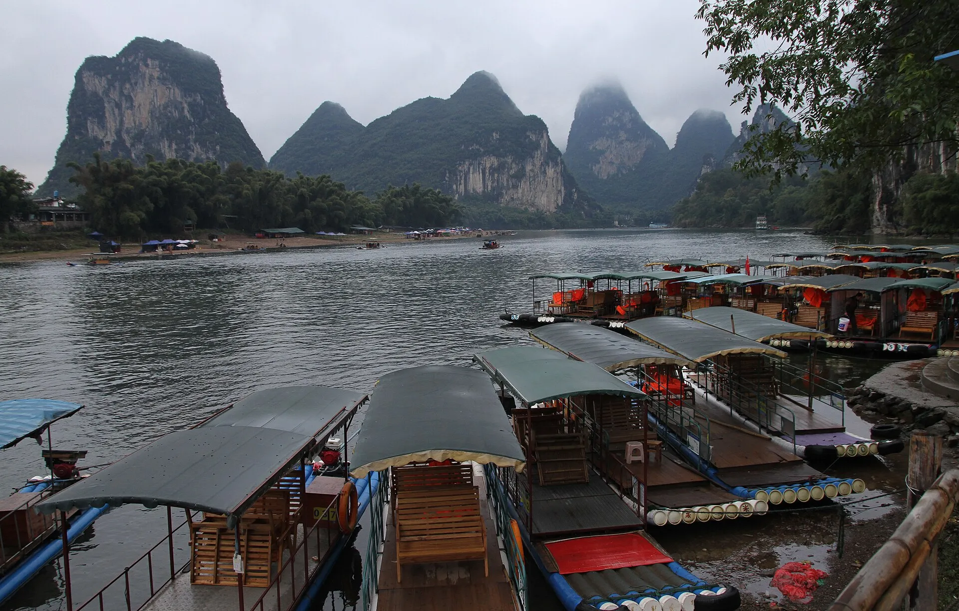 Bamboo rafts on the Li River beneath the karst peaks of Guilin and Yangshuo