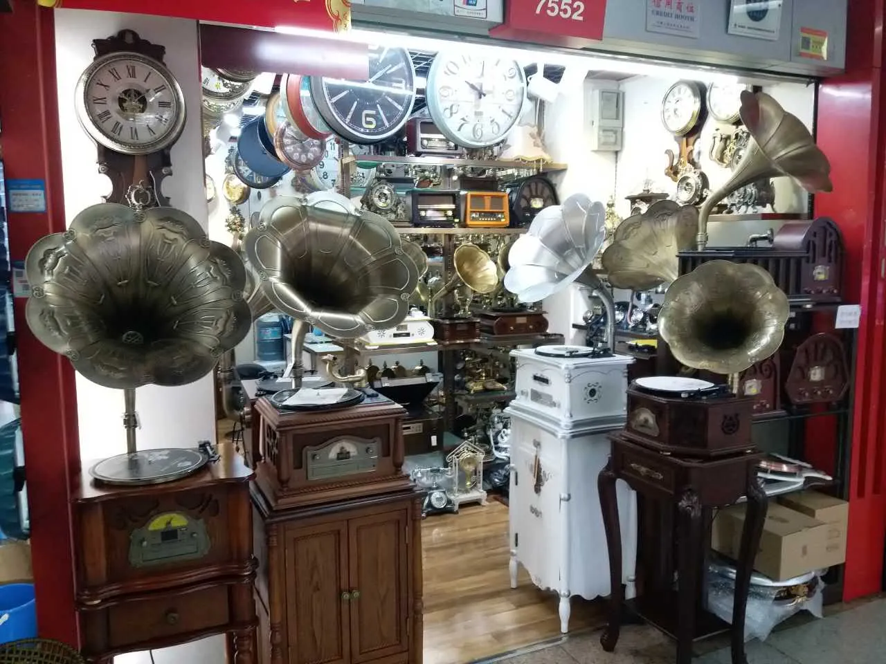 A specialised stall at Yiwu International Trade City packed with antique-style gramophones and clocks
